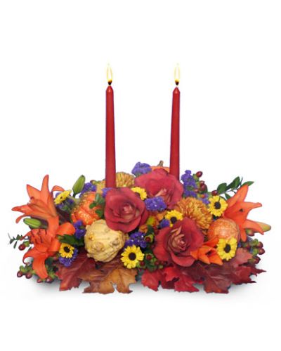 <p>Let us dress your holiday table with this beautiful fall centerpiece with Candles, Add a pop of Color to your table.</p>