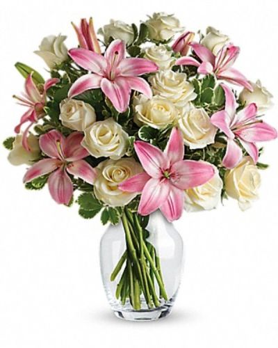 <div class="m-pdp-tabs-description">
<div id="mark-3" class="m-pdp-tabs-marketing-description">A romantic gift like this one is always appreciated. An eye-catching display of roses and lilies is perfectly arranged in a feminine vase which makes a beautiful and lasting impression.</div>
</div>
<p id="arrngDescp">Elegant white roses and sweet pink asiatic lilies are hand-arranged with greens. It's the perfect way to show you love them always and forever.</p>