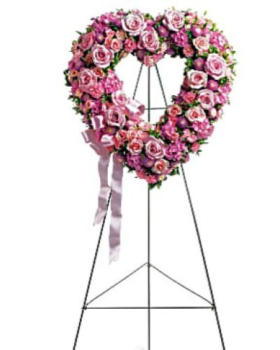 <div id="mark-1" class="m-pdp-tabs-marketing-description">In the shape of a heart, and accented with a pink satin ribbon, this garden of delicate blooms is a tender and classic tribute to a precious life, and a cherished expression of love and sympathy.</div>
<div id="desc-1">
<ul>
<li>Beautiful flowers such as light pink roses, hydrangea and miniature carnations mix with lavender chrysanthemums on an open heart-shaped wreath.</li>
</ul>
</div>
