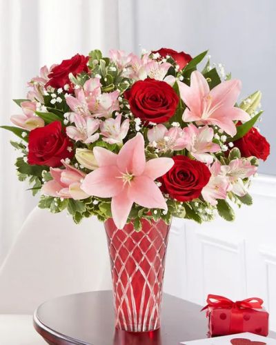<p>The key to an unforgettable Valentine’s. Our timeless red and pink bouquet is designed in a clear vase tied with red satin ribbon to help unlock all those feelings in your heart</p>