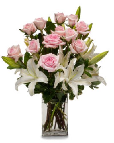 <p>Send hugs and kisses with this gorgeous arrangement of white lilies and pink roses.</p>