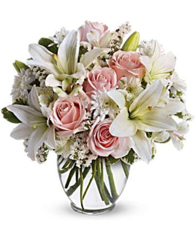 <div id="mark-3" class="m-pdp-tabs-marketing-description">Express your love with the eloquence of Shakespeare - without saying a word. She'll adore this exquisite bouquet of roses and lilies and other pastel favorites in a classic ginger vase. And she'll know just the words to let you know.</div>
<div id="desc-3">
<ul>
<li>Light pink roses, white asiatic lilies, white alstroemeria and white cushion spray chrysanthemums are mixed with white statice and variegated pittosporum in a clear, rounded vase.</li>
</ul>
</div>