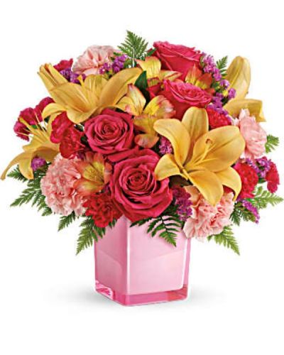 <div id="mark-3" class="m-pdp-tabs-marketing-description">Pop go the petals! This festive, fun-loving mix of flowers is a cheerful gift for any occasion. Hand-delivered in a glass cube, these pink roses and bright peach lilies are guaranteed to please!</div>
<div id="desc-3">
<ul>
<li>This fresh, fun mix of pink roses, peach asiatic lilies, peach alstroemeria, pink carnations and pink miniature carnations is accented with raspberry sinuata statice and leatherleaf fern.</li>
</ul>
</div>