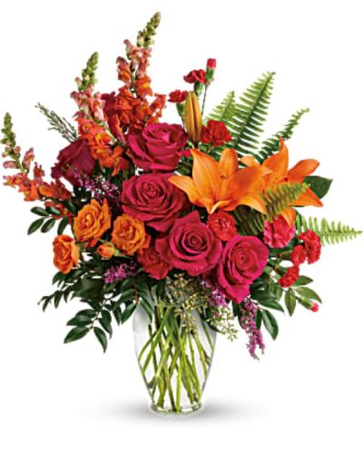<div class="m-pdp-tabs-description">
<div id="mark-2" class="m-pdp-tabs-marketing-description">The bright stuff for punching up anyone's mood! Bring happiness to any day with this bold, sunset-inspired blend of hot pink roses and orange lilies in a classic glass vase!</div>
</div>
<p id="arrngDescp">Hot pink roses, orange spray roses, orange asiatic lilies, hot pink carnations, red miniature carnations, orange snapdragons, and pink heather are accented with sword fern, huckleberry, seeded eucalyptus, and lemon leaf. Delivered in a clear glass vase.</p>