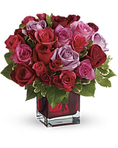 <p>Surprise her with roses in four gorgeous shades of love artistically arranged in a red contemporary cube. Imagine the look on her face when she opens the door and sees this ravishingly romantic bouquet. She'll fall in love with you all over again.</p>